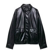 Black faux leather women's bomber jacket with long sleeves and zipper closure, casual style for autumn 2025.