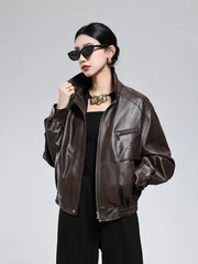 woman wearing brown pu leather jacket with turn-down collar and zipper vintage style