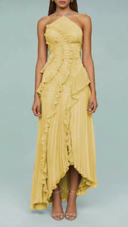 Slim fit backless sleeveless yellow pleated halter dress with ruffle details and ankle-length hem