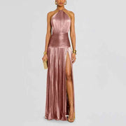Sleeveless backless halter neck maxi evening dress with side slit in metallic rose gold polyester blend fabric