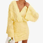 chic fashion female yellow long sleeve v neck bodycon mini dress with textured fabric