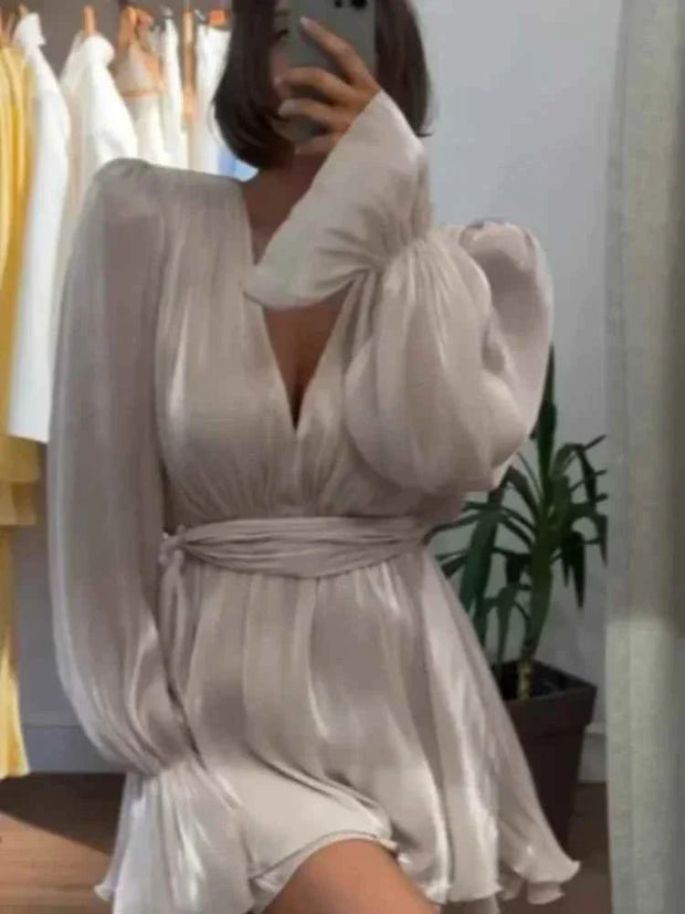 woman wearing long sleeves ribbon vestidos elegant summer evening dress with v-neck and cinched waist in light fabric