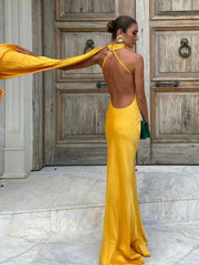 Yellow halter backless off shoulder sleeveless ankle-length slim fit women's gown with zipper closure and diagonal collar.