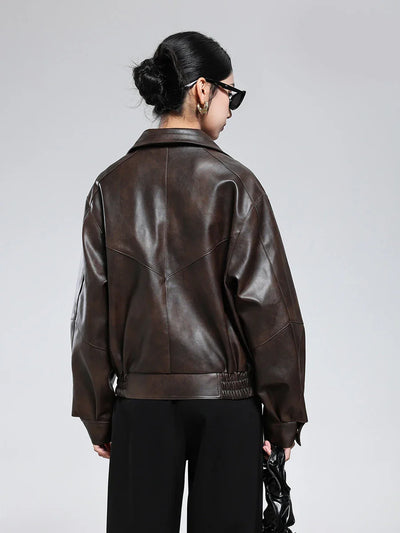 Brown PU leather jacket for women with turn-down collar and zipper closure, retro style.