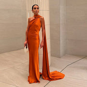 Slim fit halter backless orange off shoulder sleeveless ankle-length gown made of polyester with diagonal collar and zipper closure.