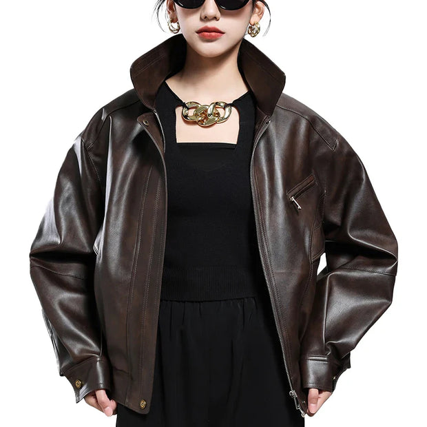 Brown PU leather jacket for women with turn-down collar and zipper closure in vintage style