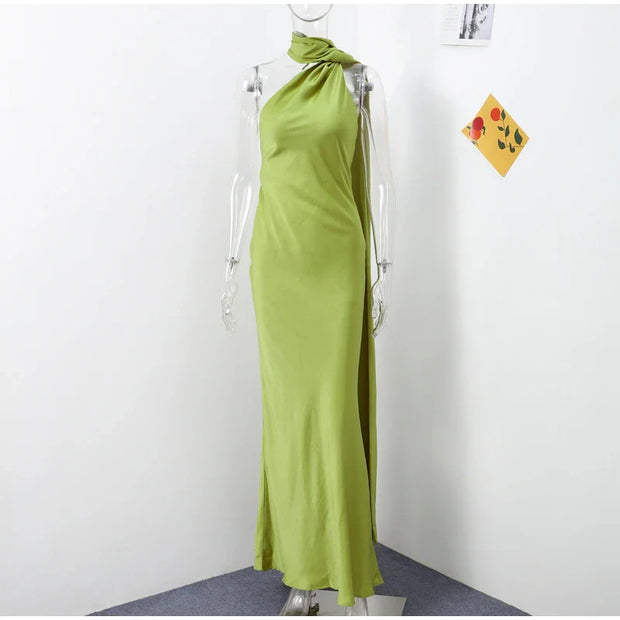 green halter neckline sleeveless backless slim fit floor-length maxi dress on mannequin