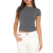 women wearing solid gray slim fit summer fashion tee with o-neck and short sleeves paired with white pants