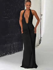 woman wearing classic solid low neck sleeveless black backless sheath long dress with ribbons