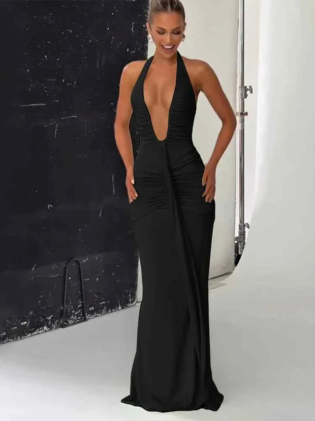 woman wearing classic solid low neck sleeveless black backless sheath long dress with ribbons