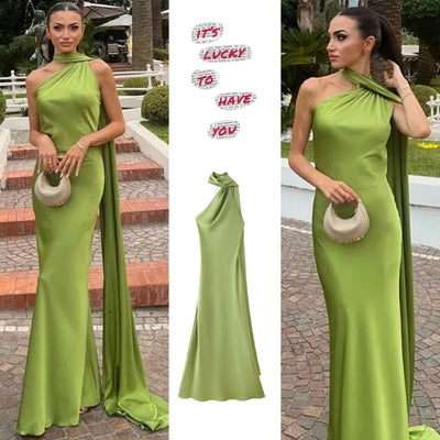 Women's sexy backless off-shoulder sleeveless green gown with asymmetrical neck and long drape detail
