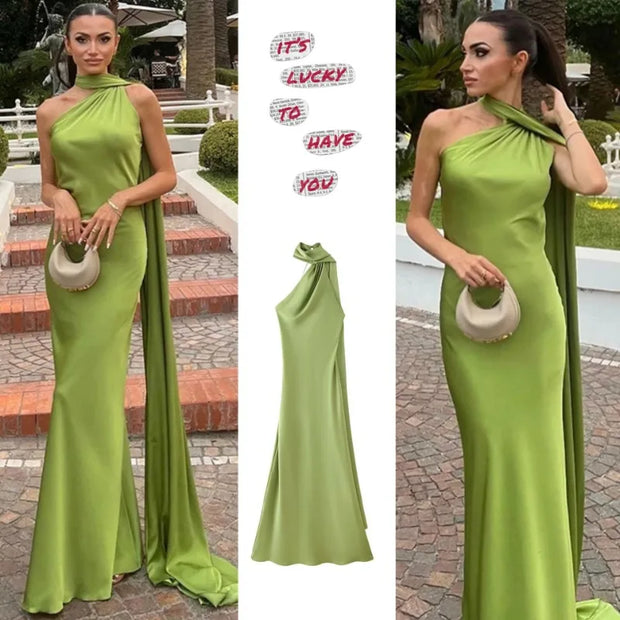 Women's sexy backless off-shoulder sleeveless green gown with asymmetrical neck and long drape detail