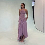 Slim fit backless sleeveless halter dress with ruffle details and ankle-length flowy skirt in lavender color